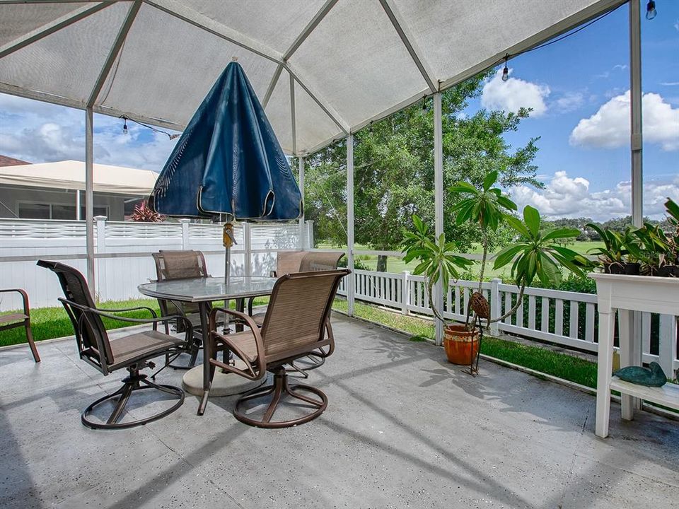 BIRDCAGE WITH SHADECLOTH ON ROOF.  A GREAT OUTDOOR SPACE!