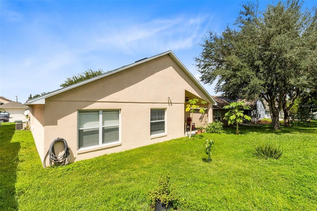 Rear exterior view of the home and your backyard.