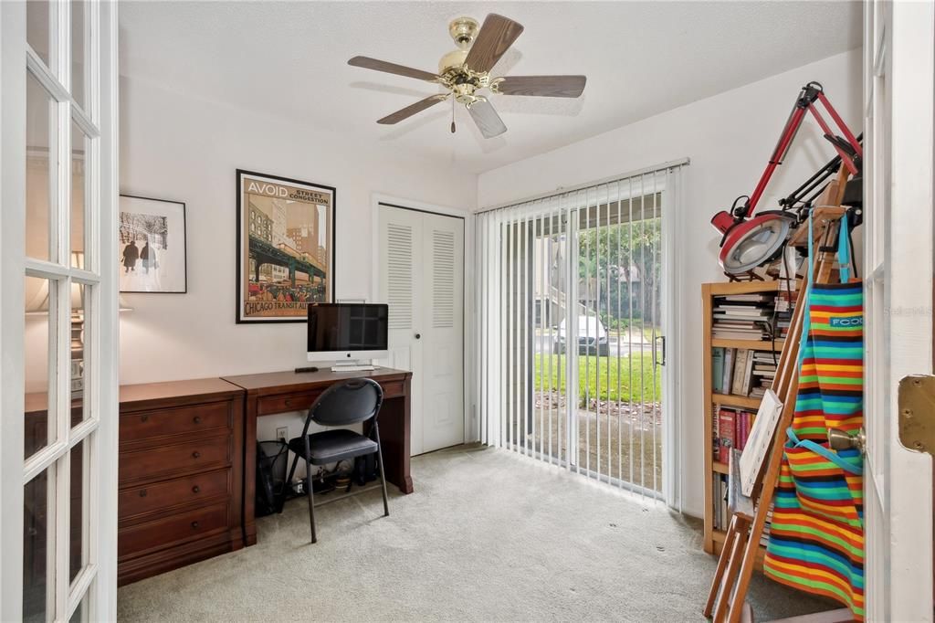 Bedroom 3 has french doors and is between kitchen & dining room