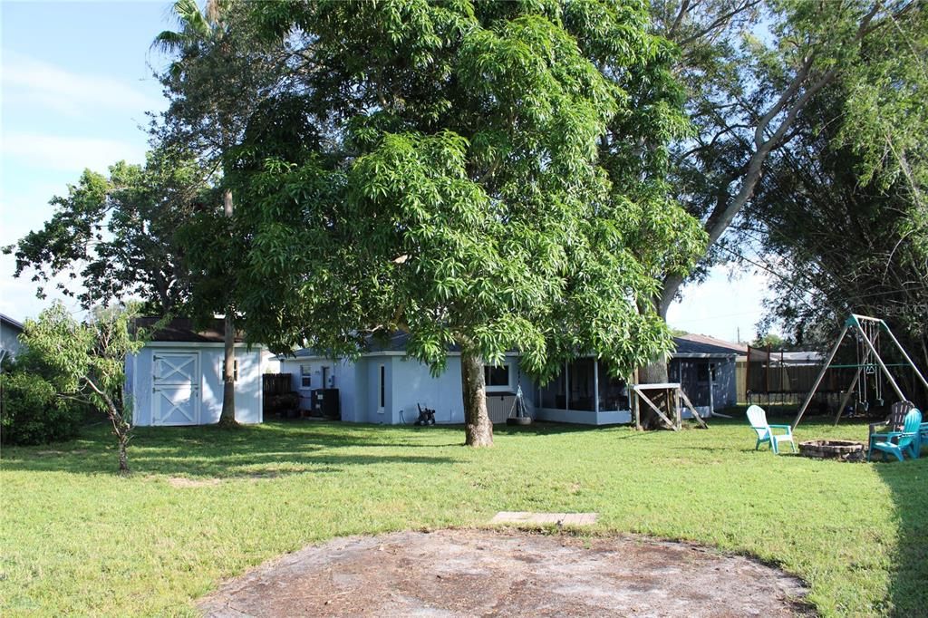 Kids activities galore! Trampoline, zipline, soccer, baseball, football, tire swing and swing set. Above ground pool was just removed.