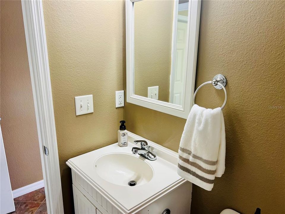 Full size sink and shower for you and your guests