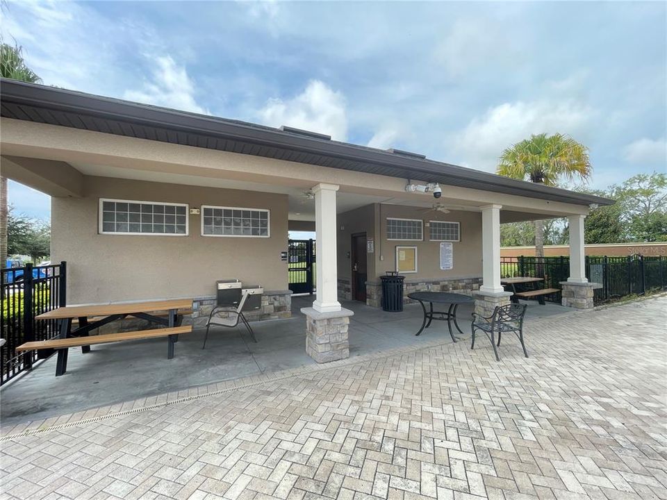 Bathrooms, grills tables in pool area