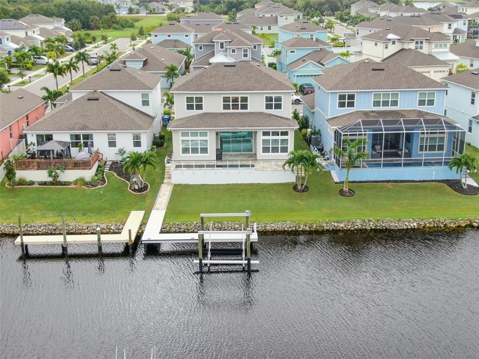 Waterfront home in MiraBay with boat dock and lift