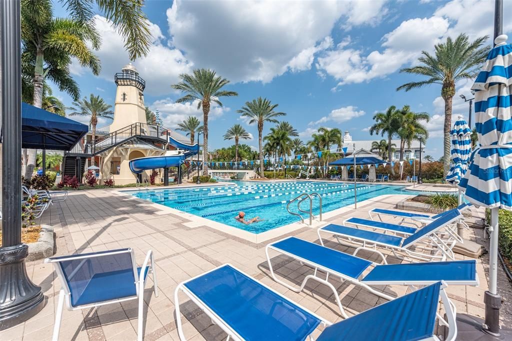 Lap pool with water slide for another community pool