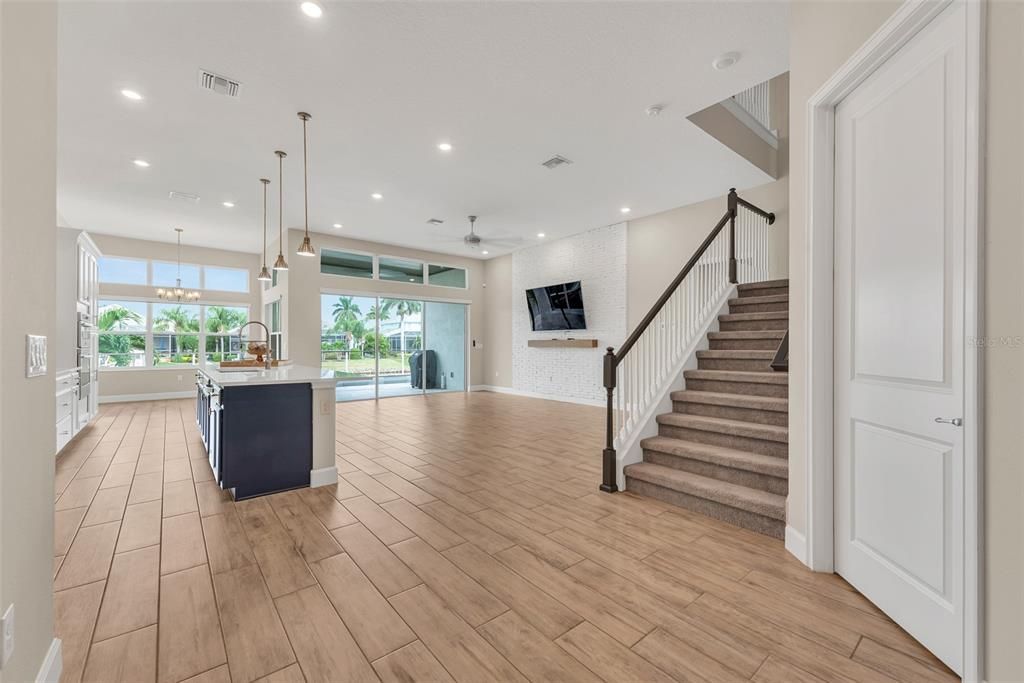 Large open plan with great room on right and eat-in kitchen of left