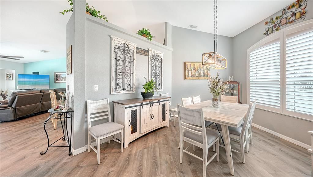 Plantation shutters, high ceilings, beautiful flooring.