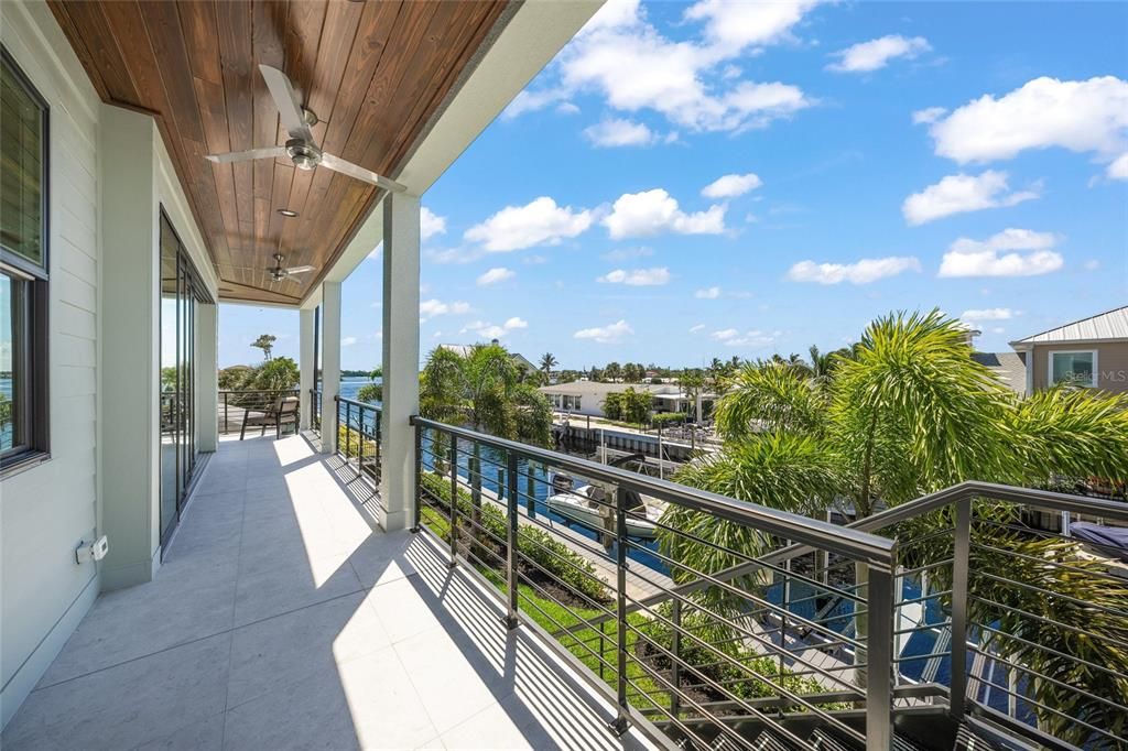 Balcony views with stairs to back dock and boat lifts - Main level