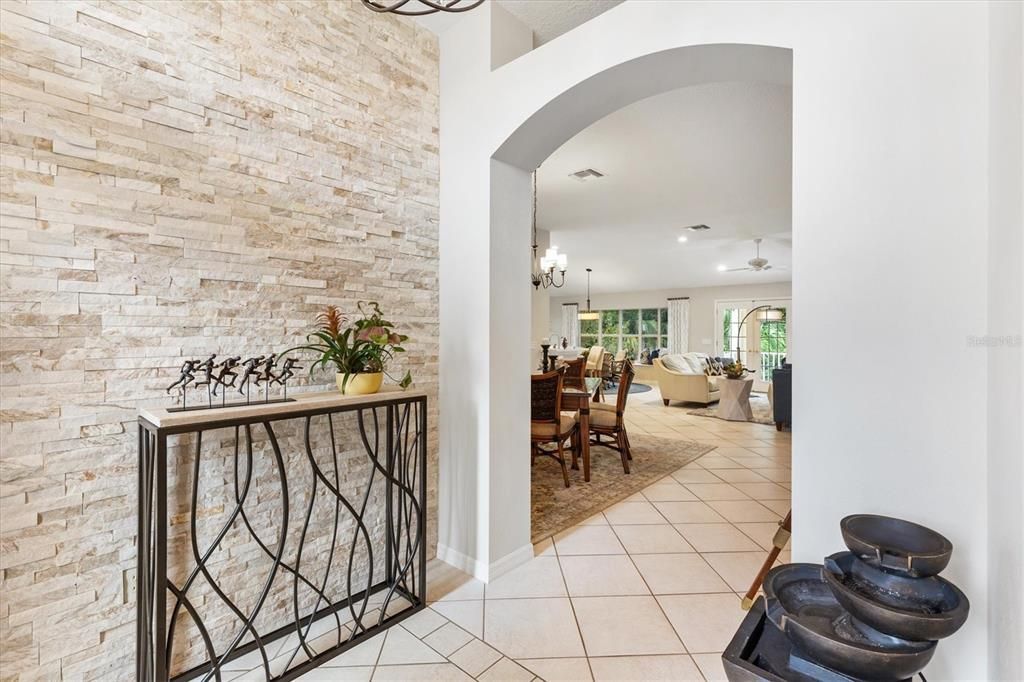 Entry Foyer with Stone Wall