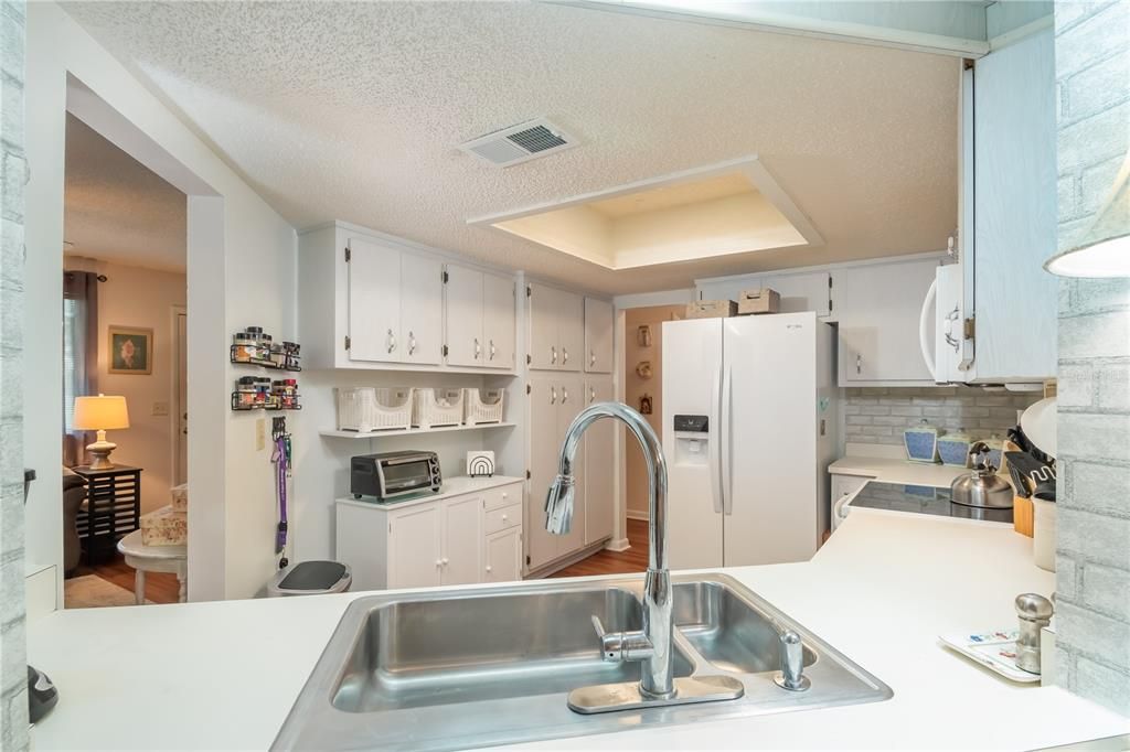 Kitchen pass -through window into the dining  room.