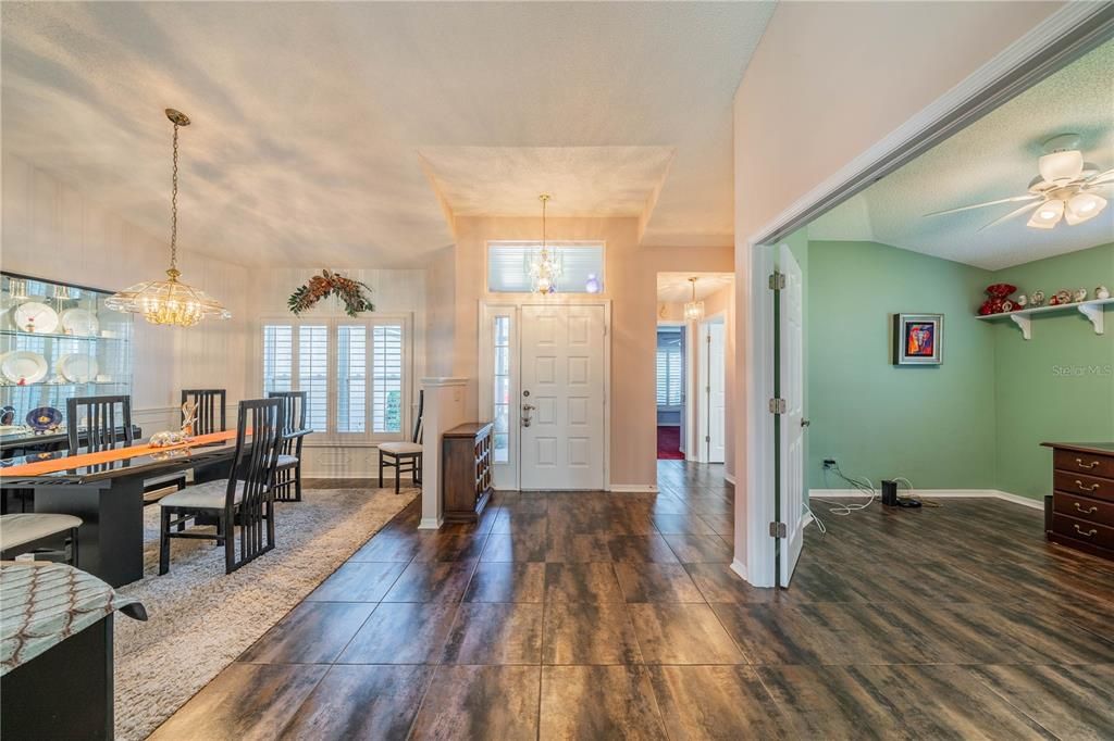 Entry way, dining room to left and office/3rd bedroom to right.