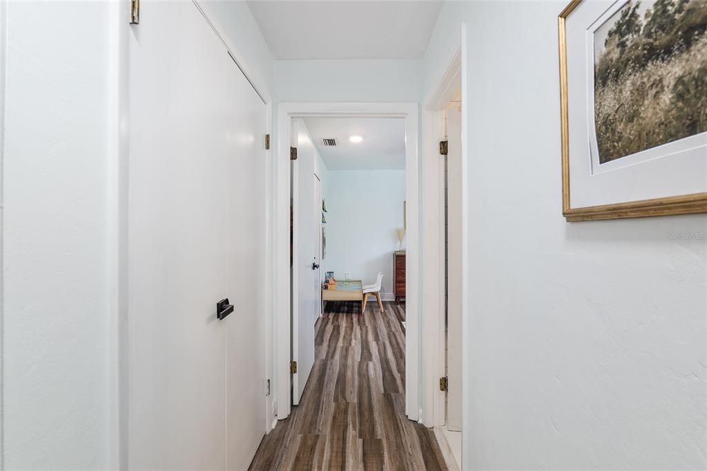 Hallway to guest bedroom 1, 2 and hall bath.