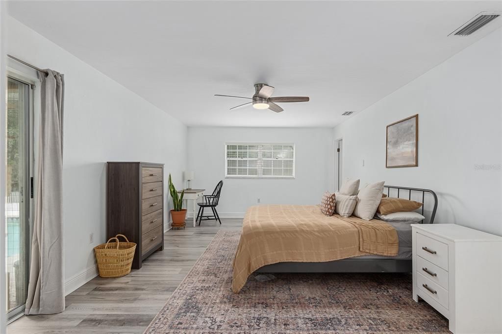 Master bedroom with private slider to pool