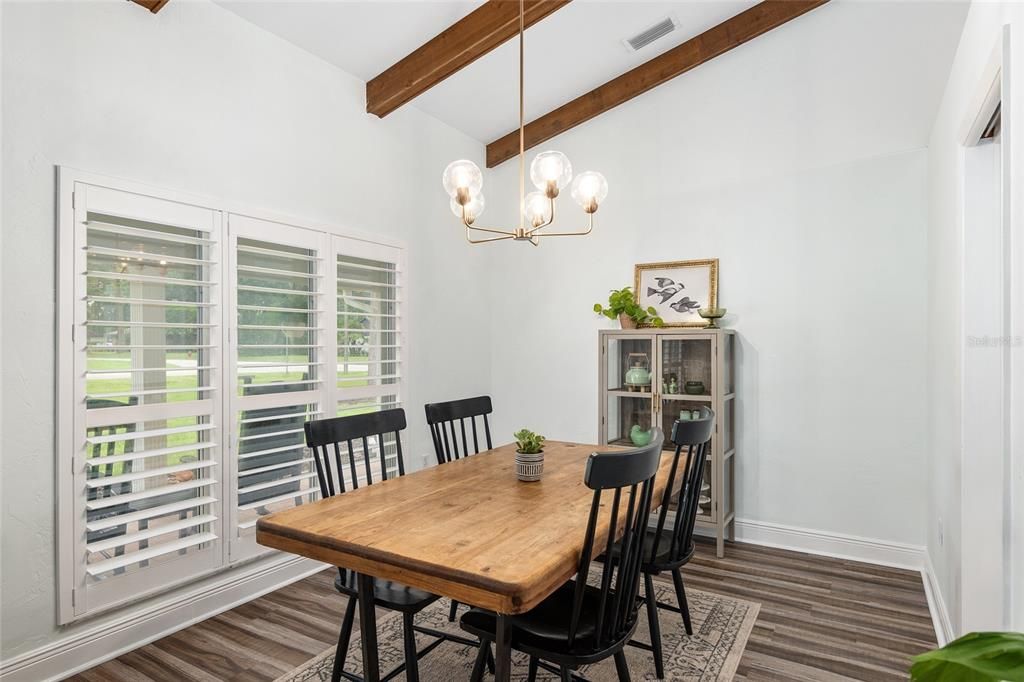 Beautiful windows and new light fixture in dining room