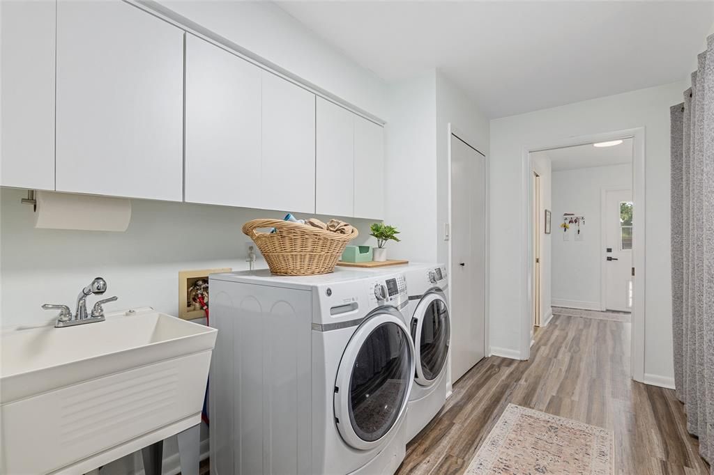 Laundry room, mudroom and additional storage