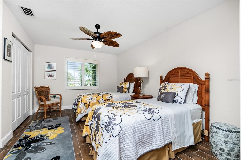 Bedroom 2 with plank tile floors