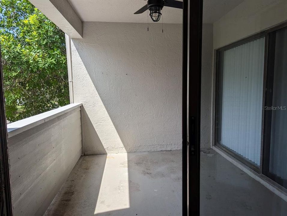 Covered patio with connecting door to master bedroom