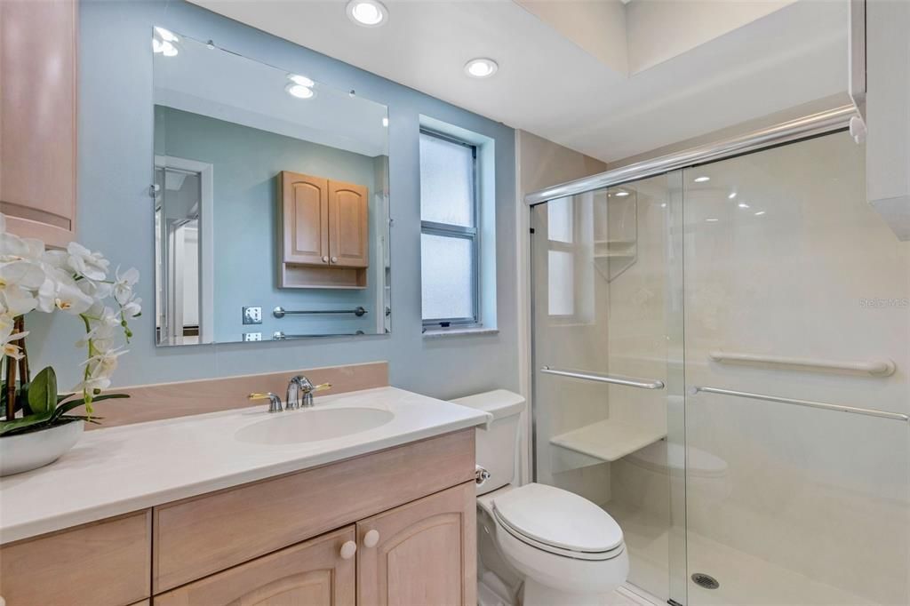 Master bath with step-in shower & built in seat~