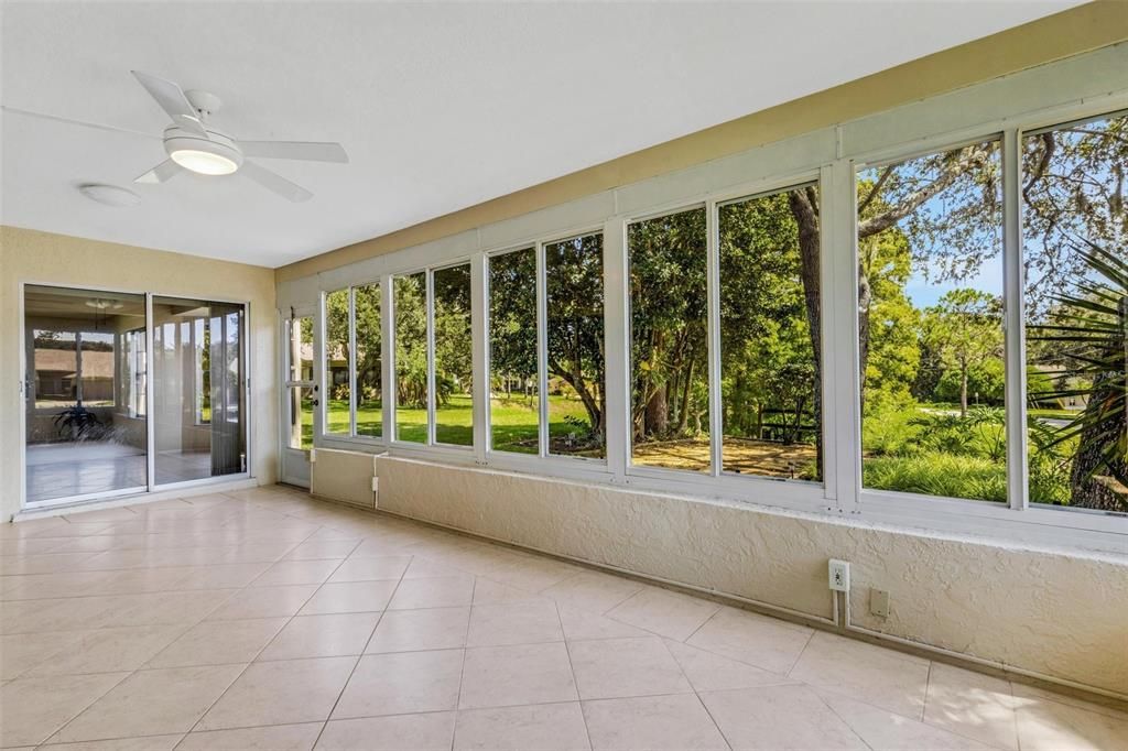 Fully enclosed bonus sunroom with newer windows to enjoy year around~