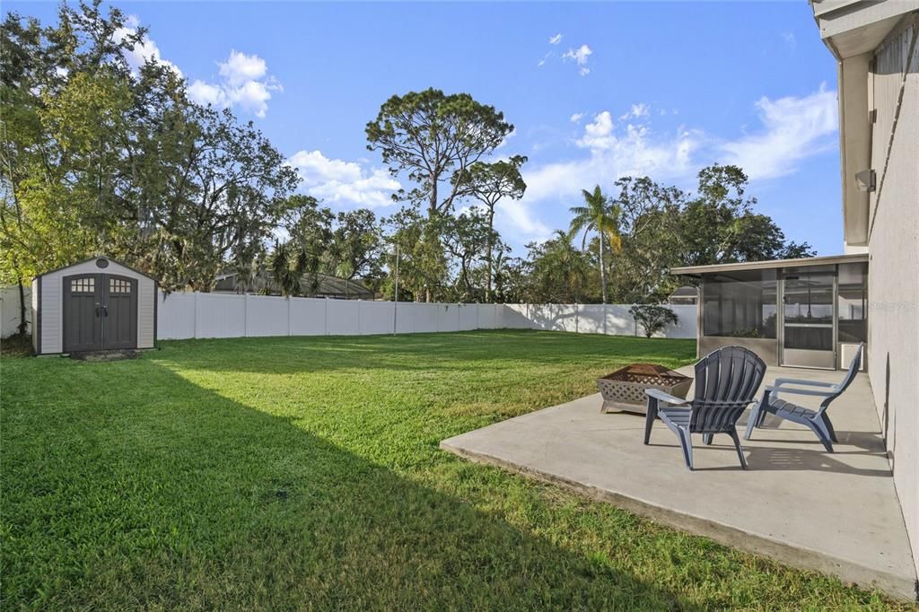 shed and firepit/BBQ area