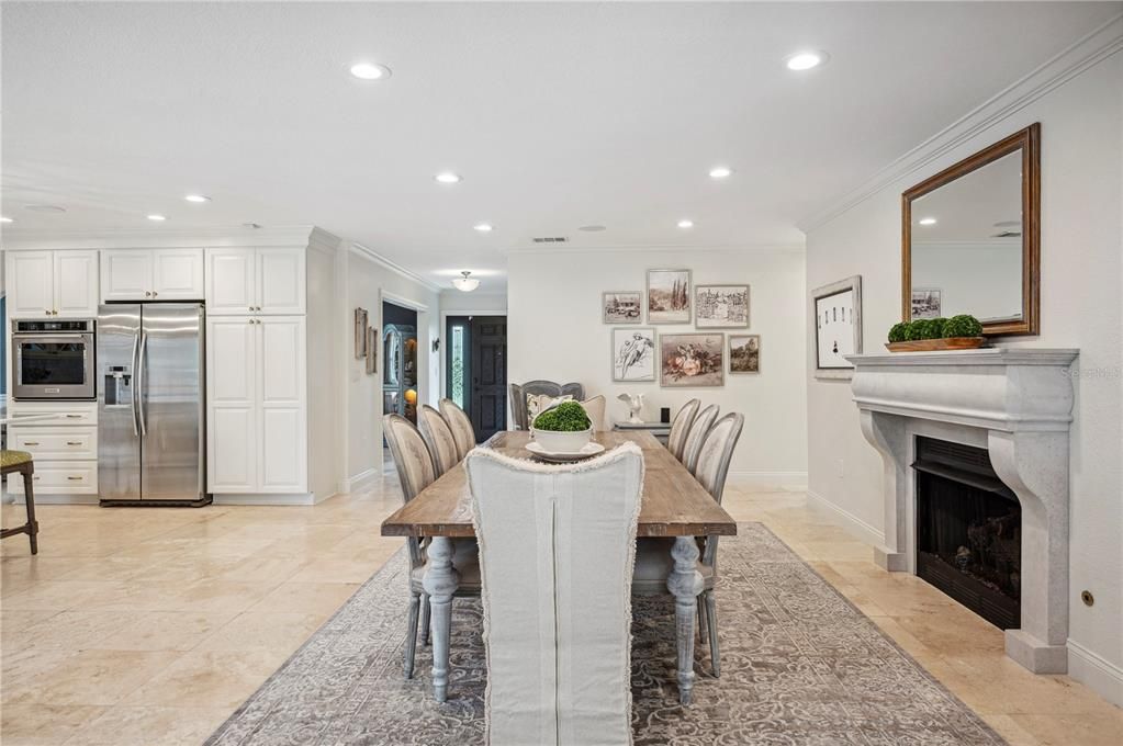 Dining room with limestone fireplace