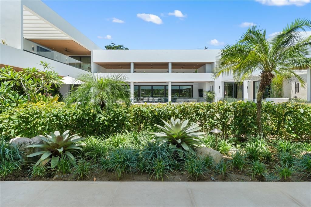 Mature tropical landscaping surround the interior courtyard creating a personal oasis.