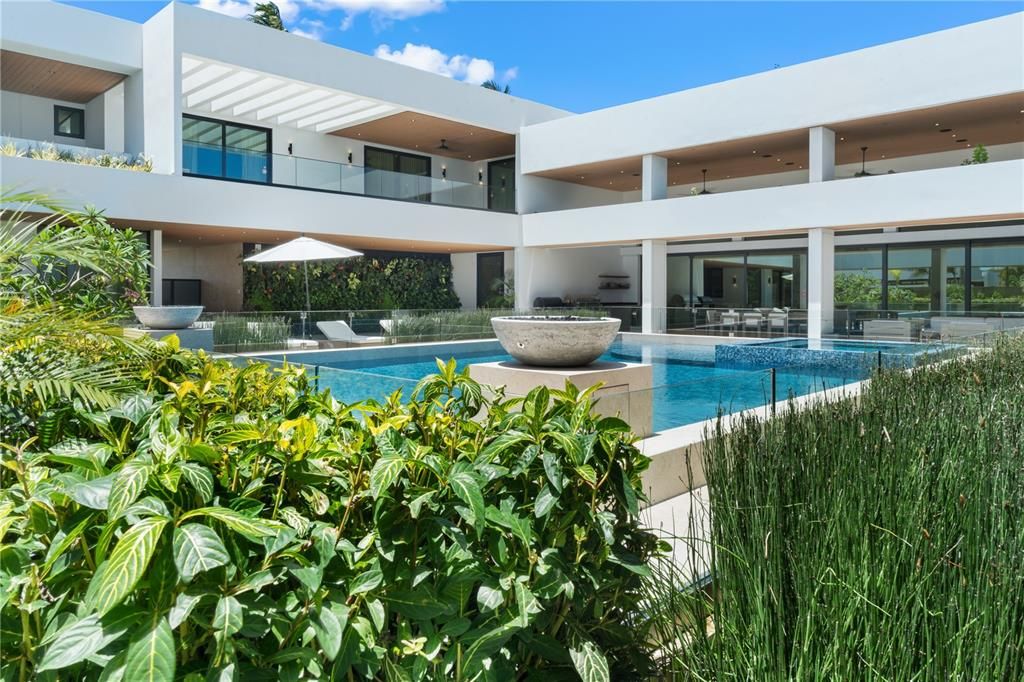 Mature tropical landscaping surround the interior courtyard creating a personal oasis.