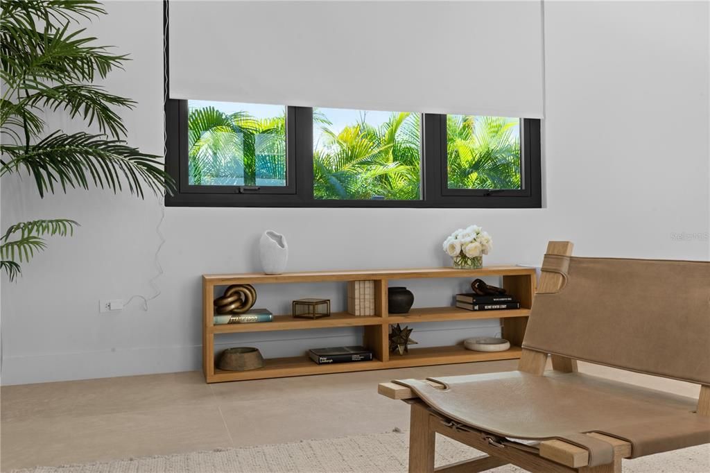 Master bedroom window views of tropical plants.