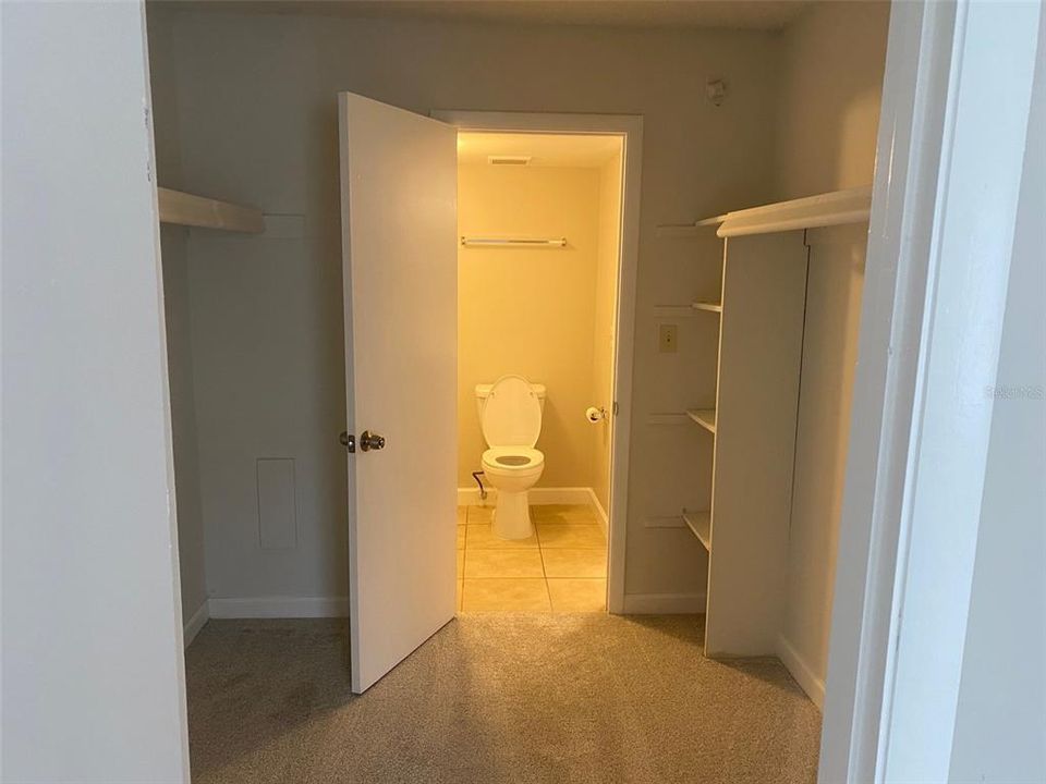 Walk-in Closet has an entrance to the bathroom