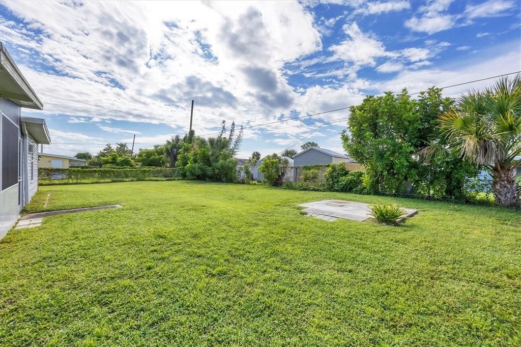 Ample Fenced In Backyard