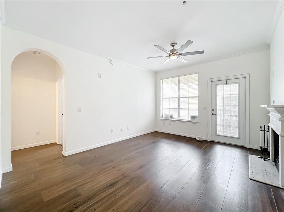 Archway leads to Bedroom and Bathroom