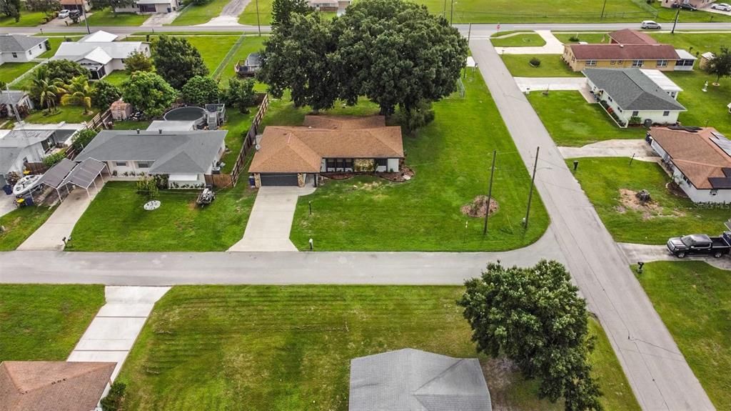 Arial view of homes corner lot