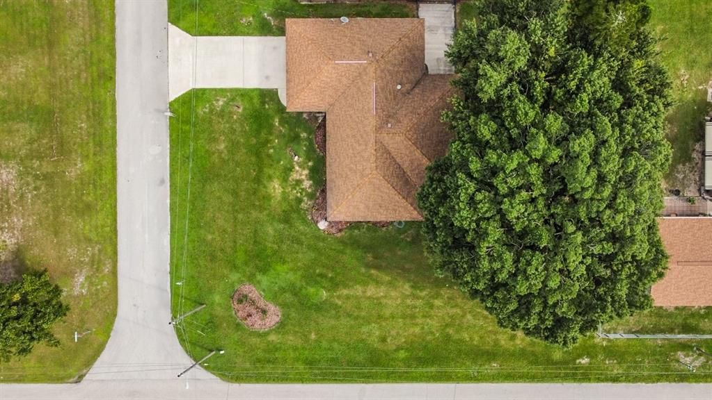 Arial view of homes corner lot