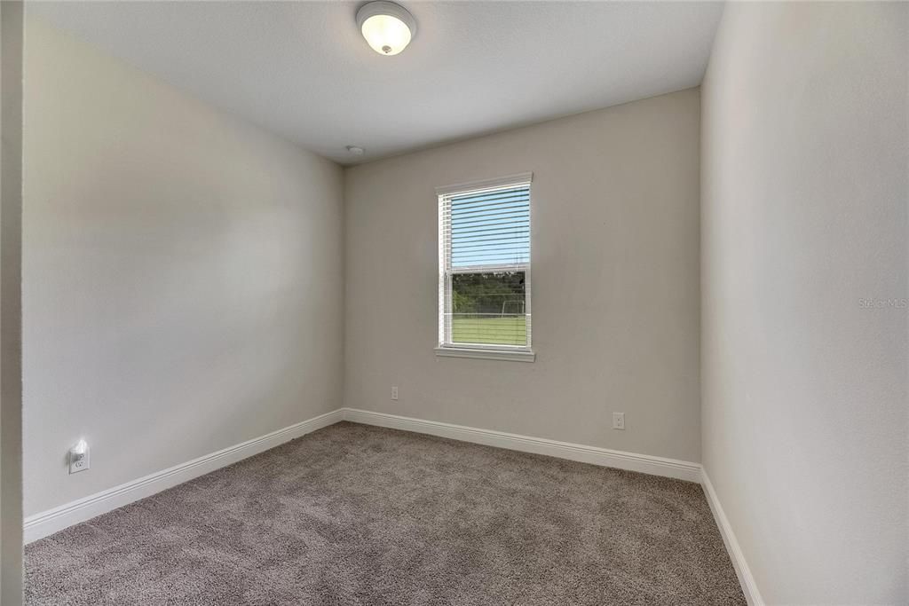 Secondary Bedroom (1)-Carpeted Main Floor/Ground Floor