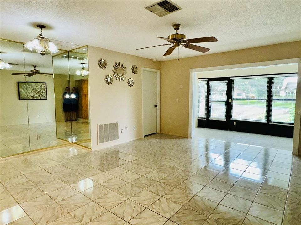 Great Room and Florida Room with View into Primary Bedroom