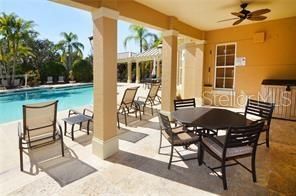 Chairs and Table by the pool.