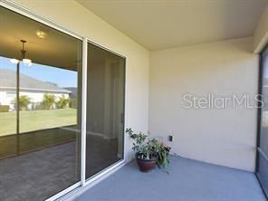 Screened in Lanai with sliding glass doors to Great Room.