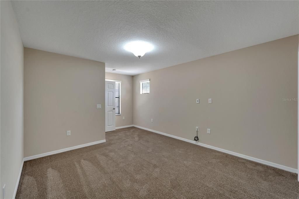 Hallway with access to Laundry Room, Bathroom 3, Bedrooms 2-3-4