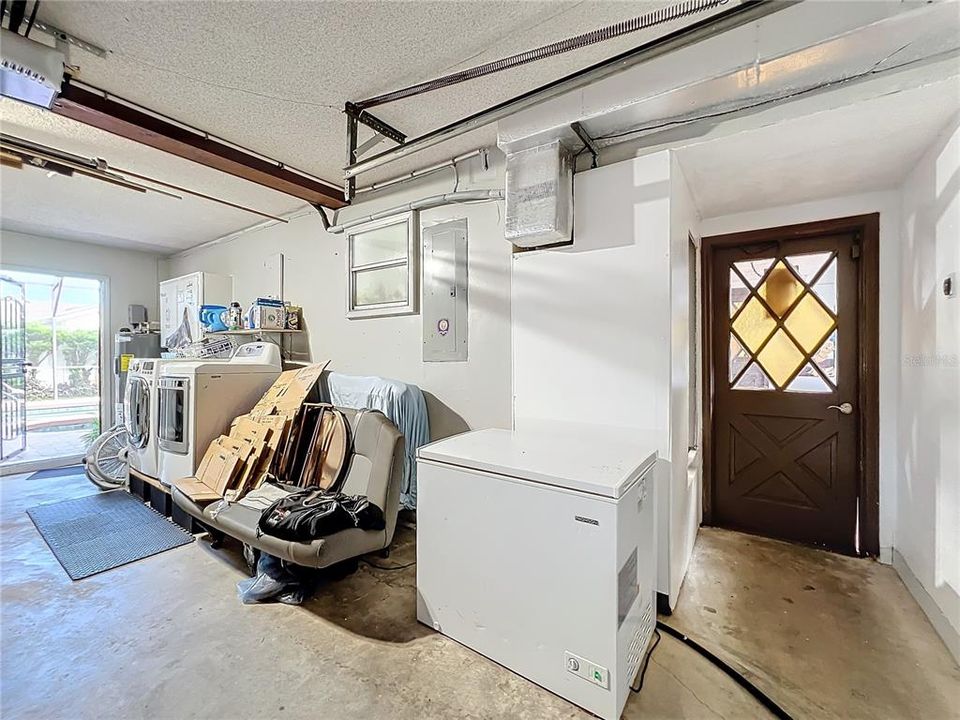 Garage Area with Washer and Dryer Hookups