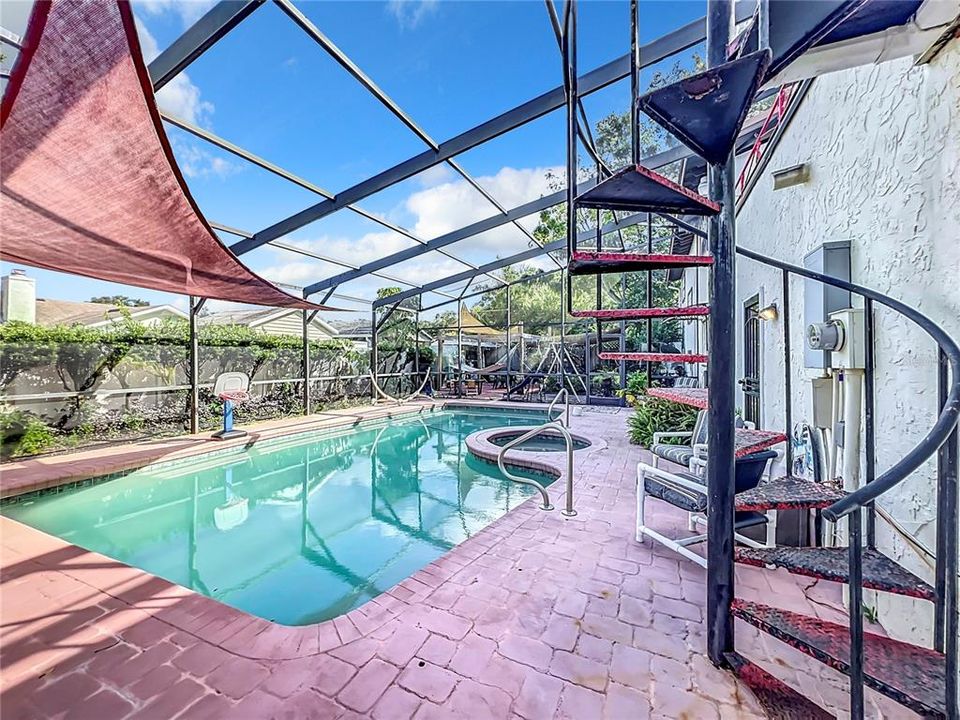 Pool w/ Spiral Stairs to 2nd Floor Patio