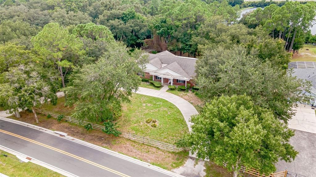 Aerial of the home with circle drive