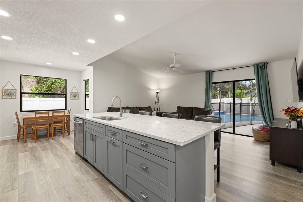 Beautiful cabinetry with a great view over looking the pool