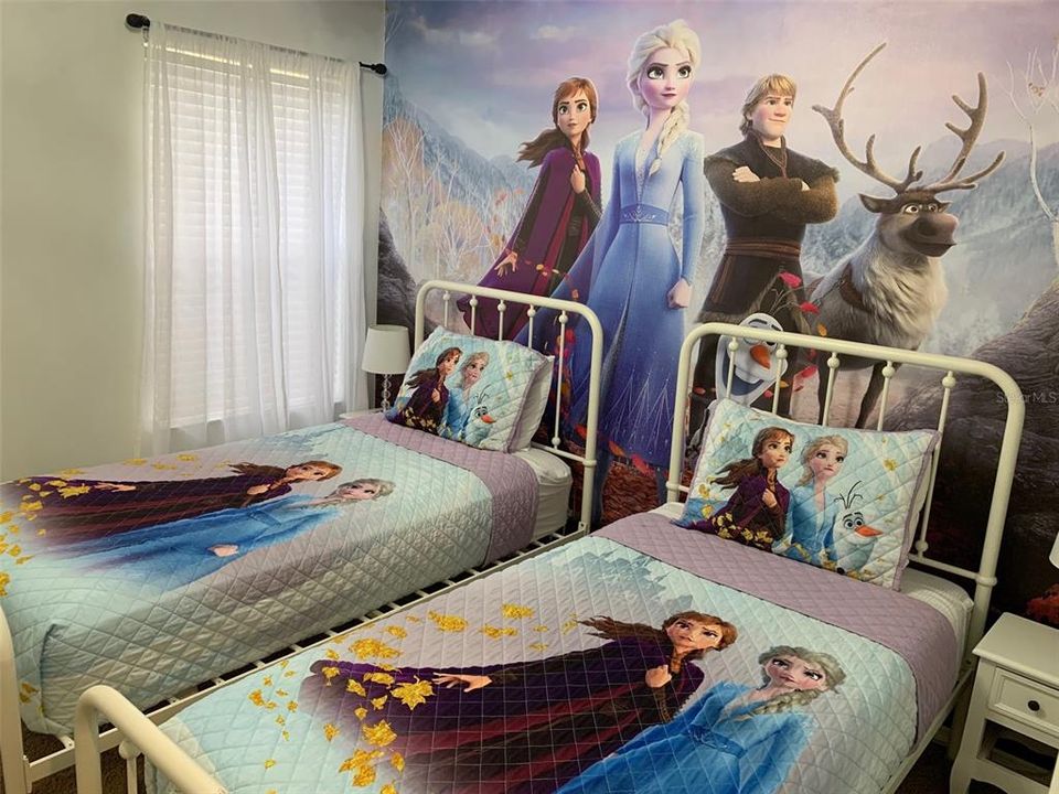 2 twin beds in bedroom #3 - Frozen.  Special wall and ceiling decor.