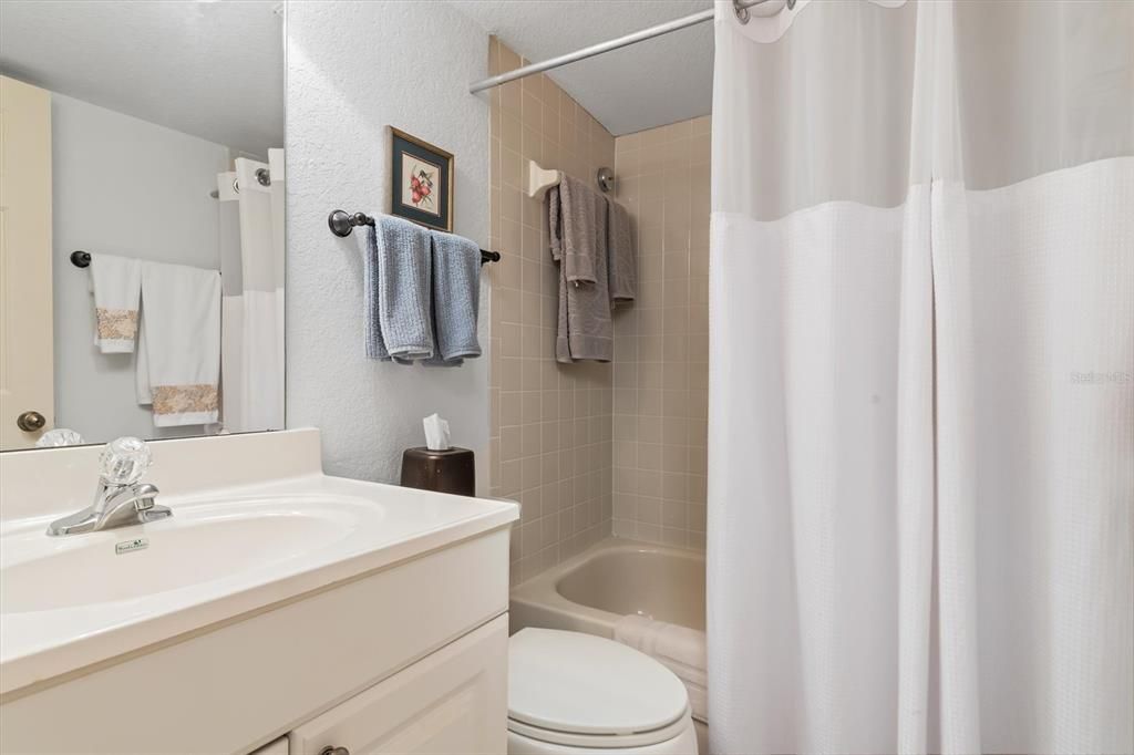 Guest bathroom with tub/shower combo