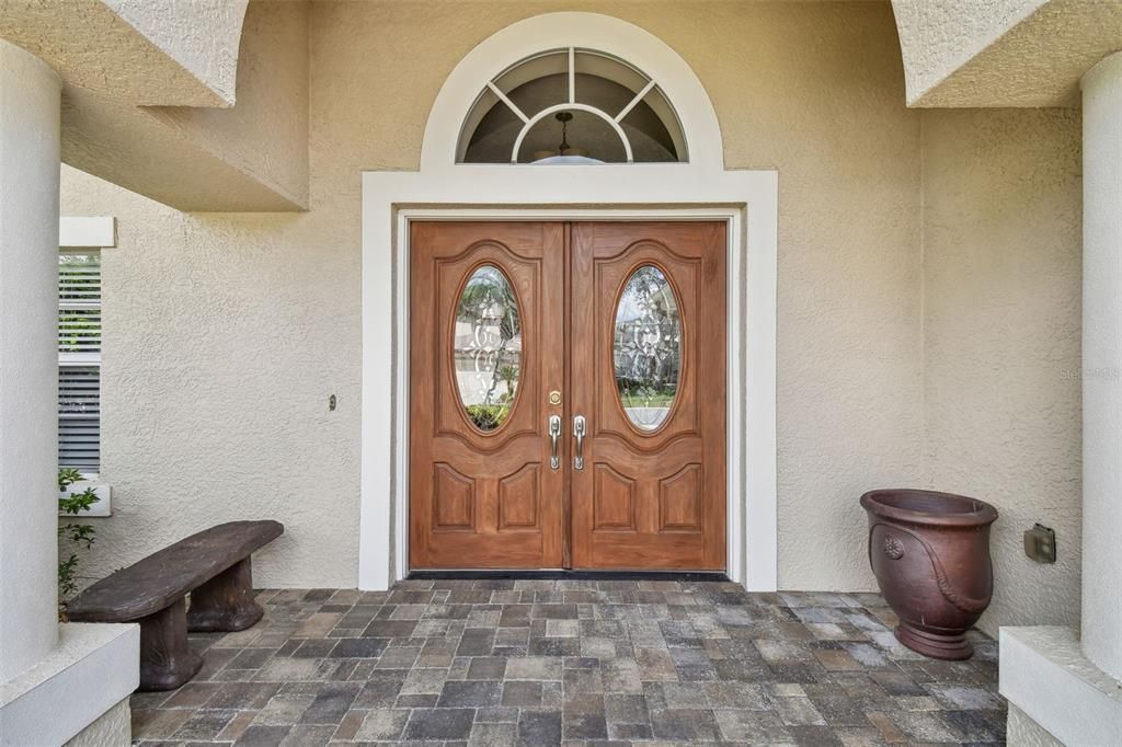 Welcome In Through The Double Beveled Glass and Wood Entry Doors!