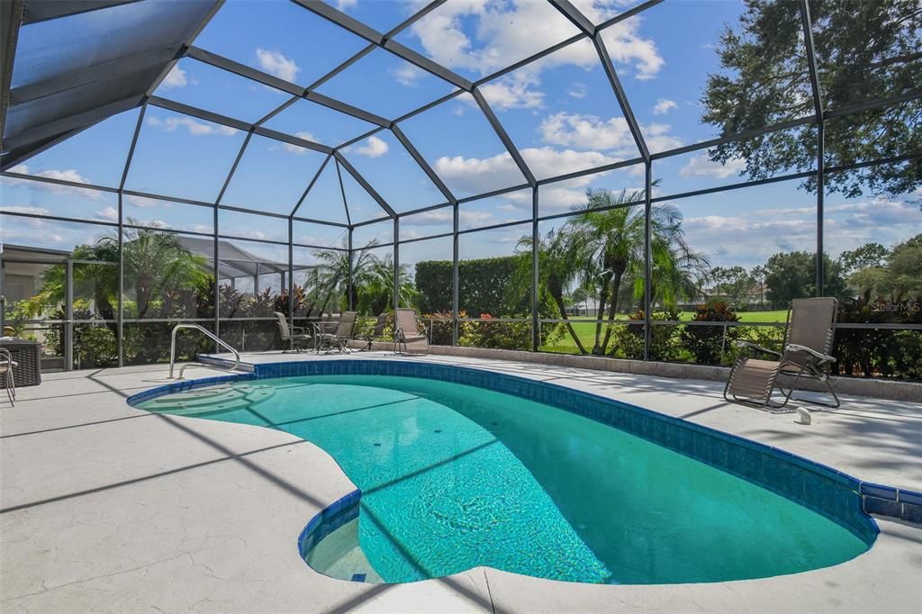 This stunning pool offers panoramic golf course views, perfect for relaxation and entertaining.