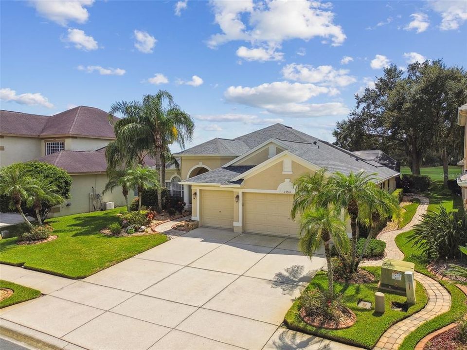 Turn-Key Beauty ~ Meticulously Cared for Inside & Out ~ Side Paved Walkway takes you to the Back!