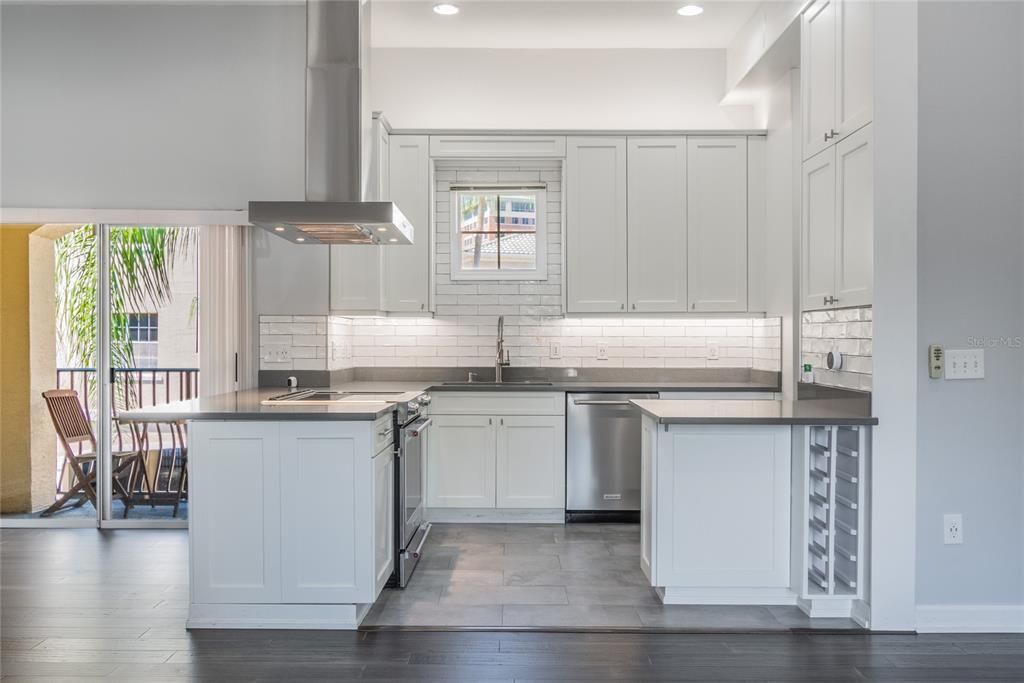 Open kitchen enjoys plenty of natural light.