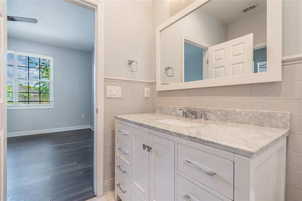 Upstairs bathroom accessible from BOTH the hallway and the upstairs master suite.