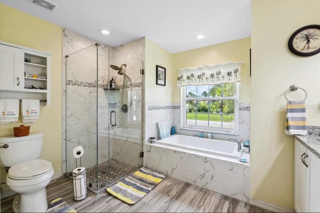 Primary Bathroom Shower and tub.