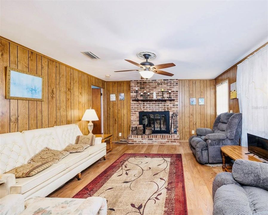 Family Room with Wood Burning Fireplace